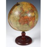 A Geographica 10 inch terrestrial globe, with railways, on a turned wood stand, 38 cm high