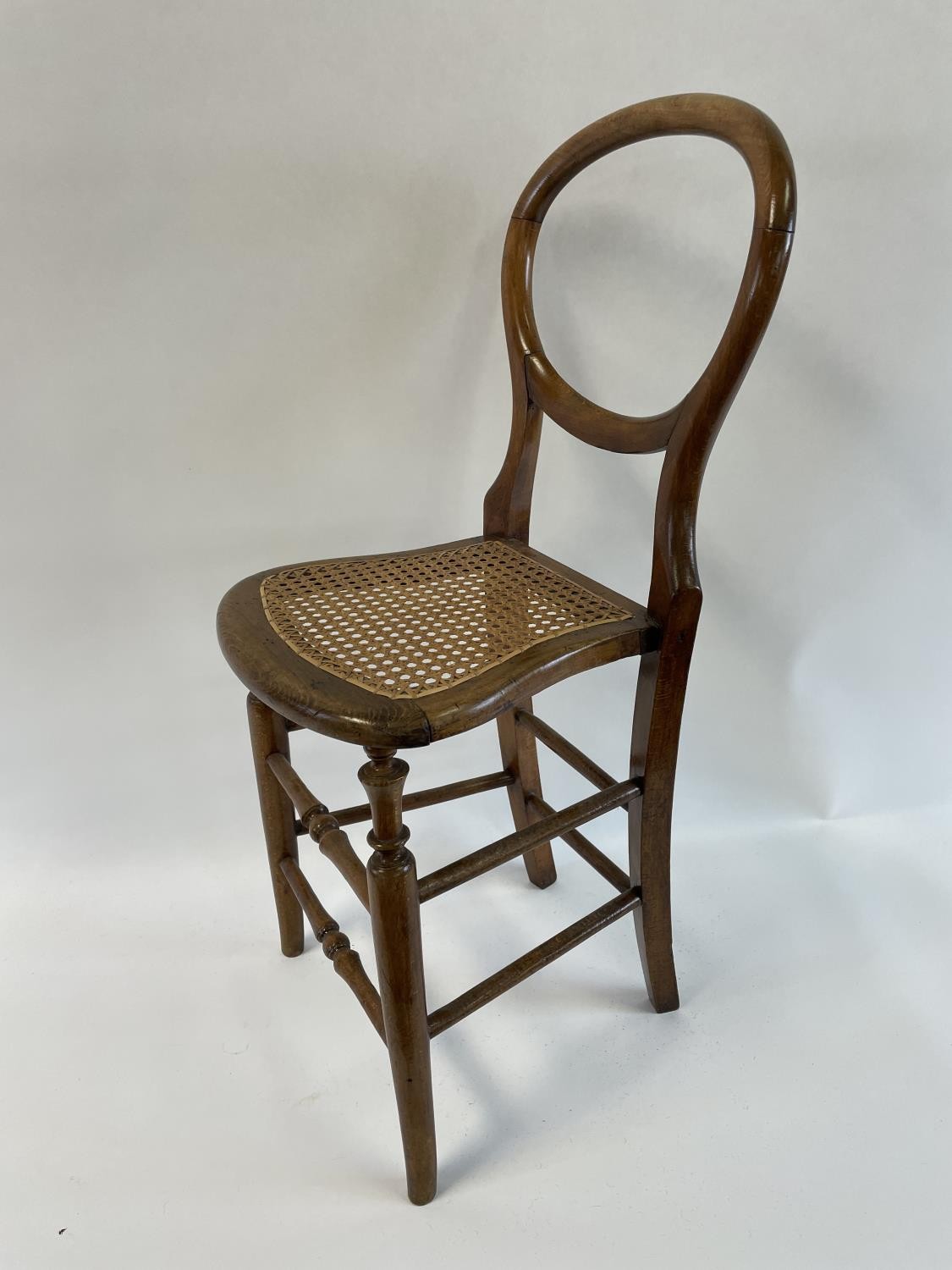 An early 20th century deportment chair