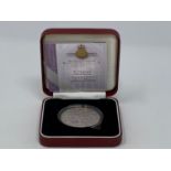An Alderney Concorde silver proof £5 coin, and other silver proof coins, all boxed