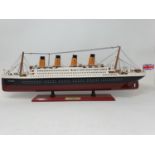 A model of the Titanic, and various other items (qty)