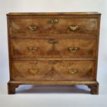 A walnut chest of three drawers, previously part of a chest on chest, 101 cm wide