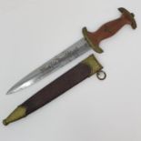 A Third Reich SA dagger the blade marked Rob Giersch, Solingen, with a scabbard, stamped 15/25063,