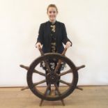 A ships wheel, with painted metal mounts, 107 cm diameter