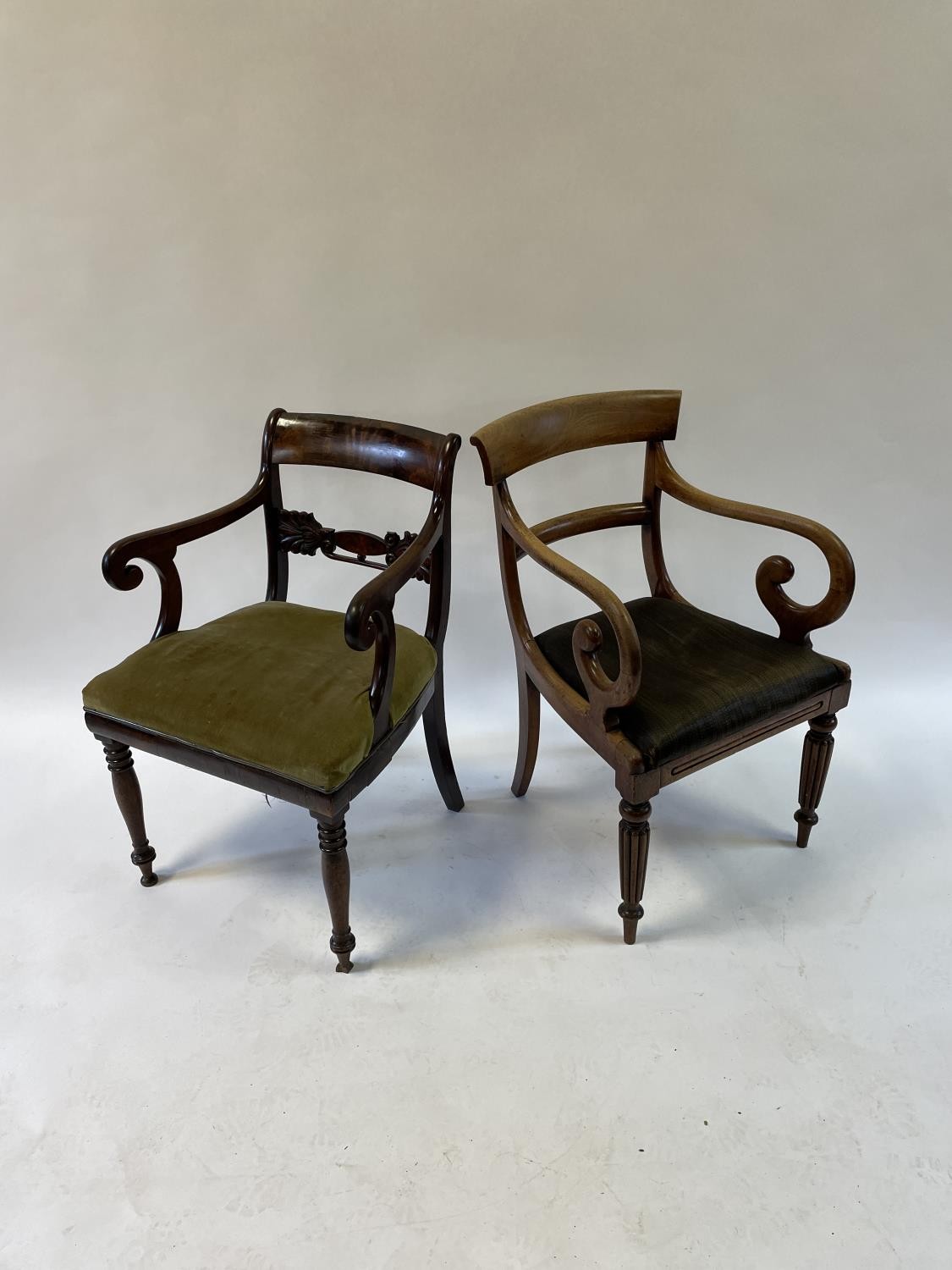 A 19th century mahogany armchair, with a drop in seat, on turned reeded tapering front legs, and six