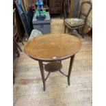 A mahogany oval table, 66 cm wide, a walnut single chair, a corner cabinet, and a green ground