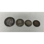 A William III shilling, 1696, and three other coins (4)