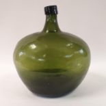 A large green glass bottle, 44 cm high