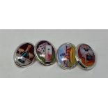 A pair of silver enamel cufflinks, decorated vices (2) This is a modern copy