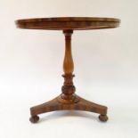 A 19th century rosewood table, with column support to triangular base and pad feet, 77 cm diameter