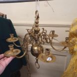 A Dutch style brass six branch chandelier, 50 cm diameter