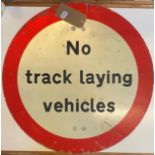 A road sign, No track laying vehicles, 61 cm diameter