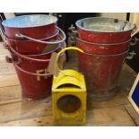 A set of six red painted metal Fire buckets, with swing handles, a yellow painted metal road lamp,