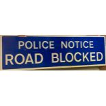 A road sign, POLICE NOTICE ROAD BLOCKED, 51 x 168 cm