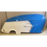 A Lambretta 225 side panel, painted blue and white, 85 cm wide, now used as a piece of wall art