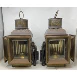 A pair of brass Eli Griffiths & Sons Meteor double sided lamps, 43 cm high