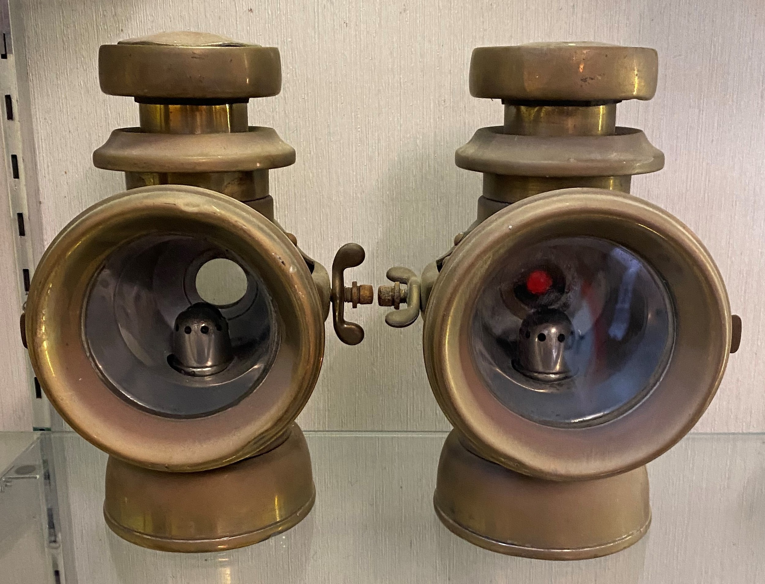 A pair of brass Lucas King's Own lamps, No. F145, slight loss