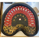 An R Harris cast iron painted tractor seat, 40 cm wide