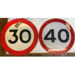 A road sign, 30, 61 cm diameter, and another 40 (2)