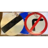 A national speed limit sign, 61 cm diameter, and a no right turn sign, 60 cm diameter, and a