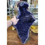 An Amethyst crystal geode 52 cm high