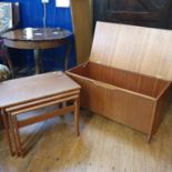 A Danish teak nest of three tables, 62 cm wide and a trunk (2)
