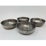 A set of Arts & Crafts pewter finger bowls, stamped Liberty & Co, 11 cm diameter (4)