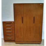 A G-Plan bedroom suite, comprising a dressing table, 137 cm wide, a chest of drawers, 56 cm wide,