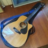 A Yamaha Electro-acoustic guitar, and case