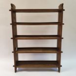 An Arts and Crafts oak bookcase, 85 cm wide