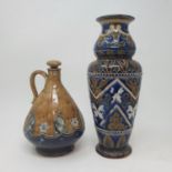 A Royal Doulton flagon, with a stopper, 21 cm high and a Doulton Lambeth vase, 29 cm Vase with