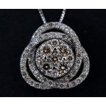 An 18ct white gold and diamond pendant, on a chain Diamond weight 0.75ct approx.