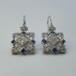 A pair of 9ct gold, sapphire and diamond earrings