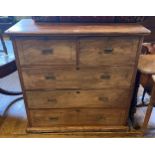 A late 19th/early 20th century camphorwood military style chest, the top section having two short