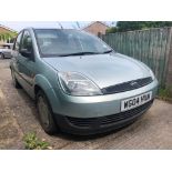 A 2004 Ford Fiesta Finesse, registration number WG04 HXN, 1242 cc petrol, metallic blue, five doors,