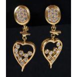 A pair of yellow gold open work heart shape earrings, set with brilliant cut diamonds Untested