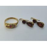 An 18ct gold, garnet and diamond ring, ring size L 1/2 and a pair of garnet drop earrings (3) Ring