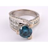 A 14ct white gold, white diamond and blue diamond ring, by Sophia Fiori, ring size I