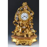 An early 20th century mantel clock, with an 8 cm diameter dial with twin train movement striking