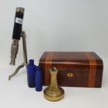 A monocular, a cigar lighter in the form of a lighthouse and various other items (box)