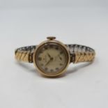 A ladies 9ct gold Rolex Precision wristwatch, with Arabic numerals and subsidiary seconds dial We