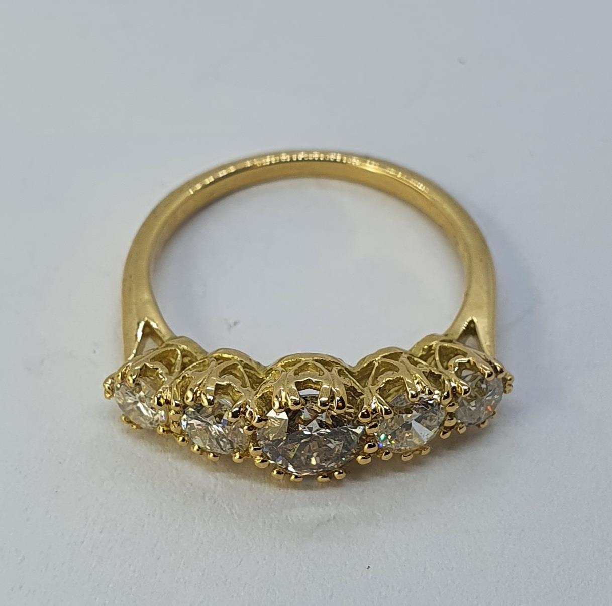 An 18ct gold and five stone diamond ring, ring size K Diamond weight 1.59ct approx. with the - Image 3 of 4