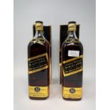 Two litre bottles of Johnnie Walker Black Label whisky, with cardboard boxes (2)