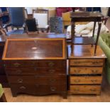 A mahogany chest of four drawers, a mahogany bureau, a two tiered table, and a coffee table (4)