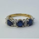 A 9ct gold, sapphire and diamond ring, ring size M 1/2 Sapphires 1.78ct approx. Diamonds 0.05ct