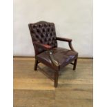 A red leather Gainsborough type armchair 100 cm high x 71 cm wide x 70 cm deep (approx), leather