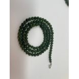 A jade bead necklace