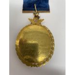 A Victorian yellow coloured metal, blue stone, diamond and ruby masonic jewel/medal, inscribed,