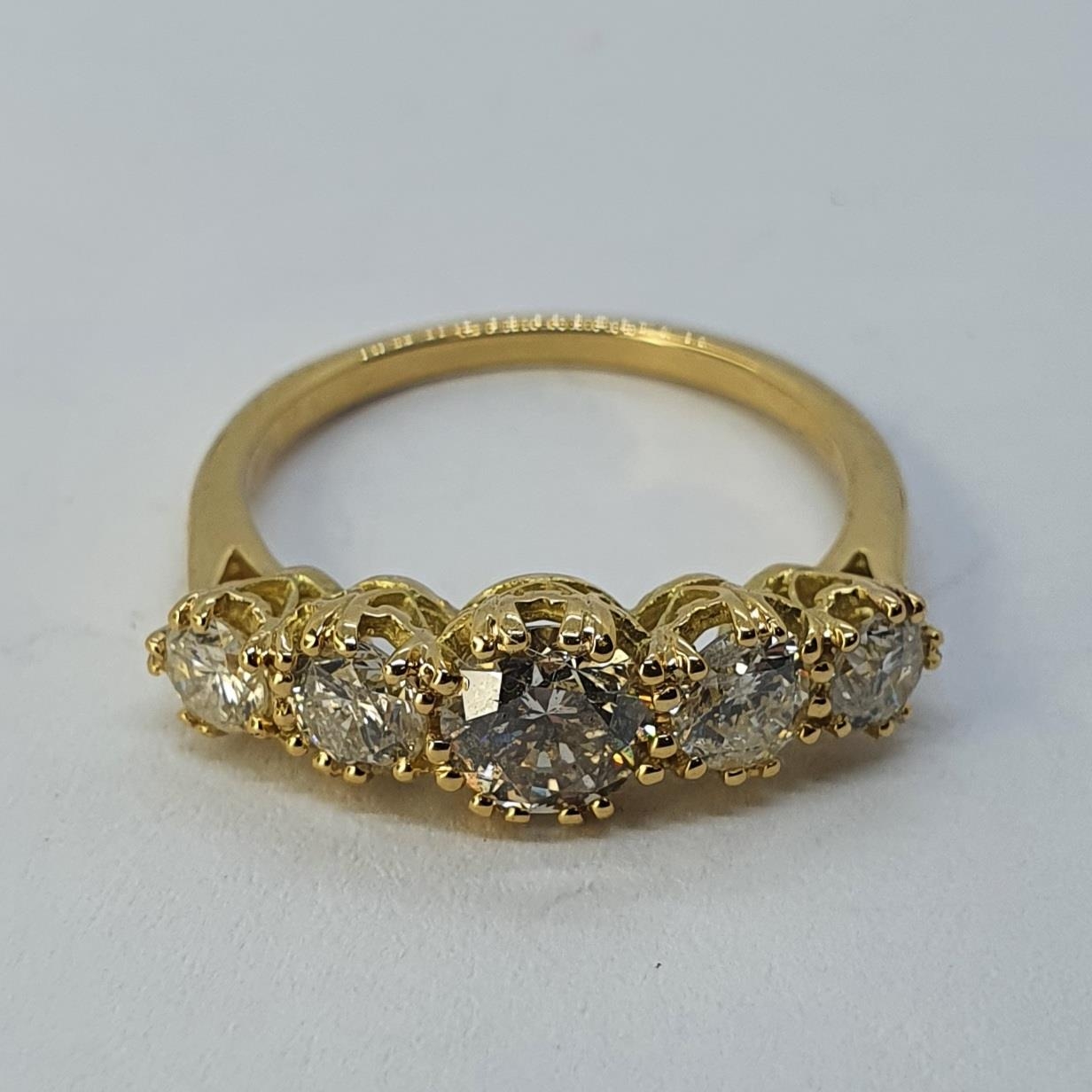 An 18ct gold and five stone diamond ring, ring size K Diamond weight 1.59ct approx. with the - Image 2 of 4