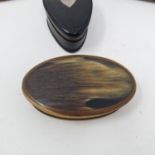 A 19th century horn snuff box, 10 cm wide, and three other snuff boxes (4)