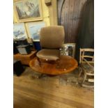 A modern walnut oval coffee table, 141 cm wide, a 19th century style mahogany nursing chair and